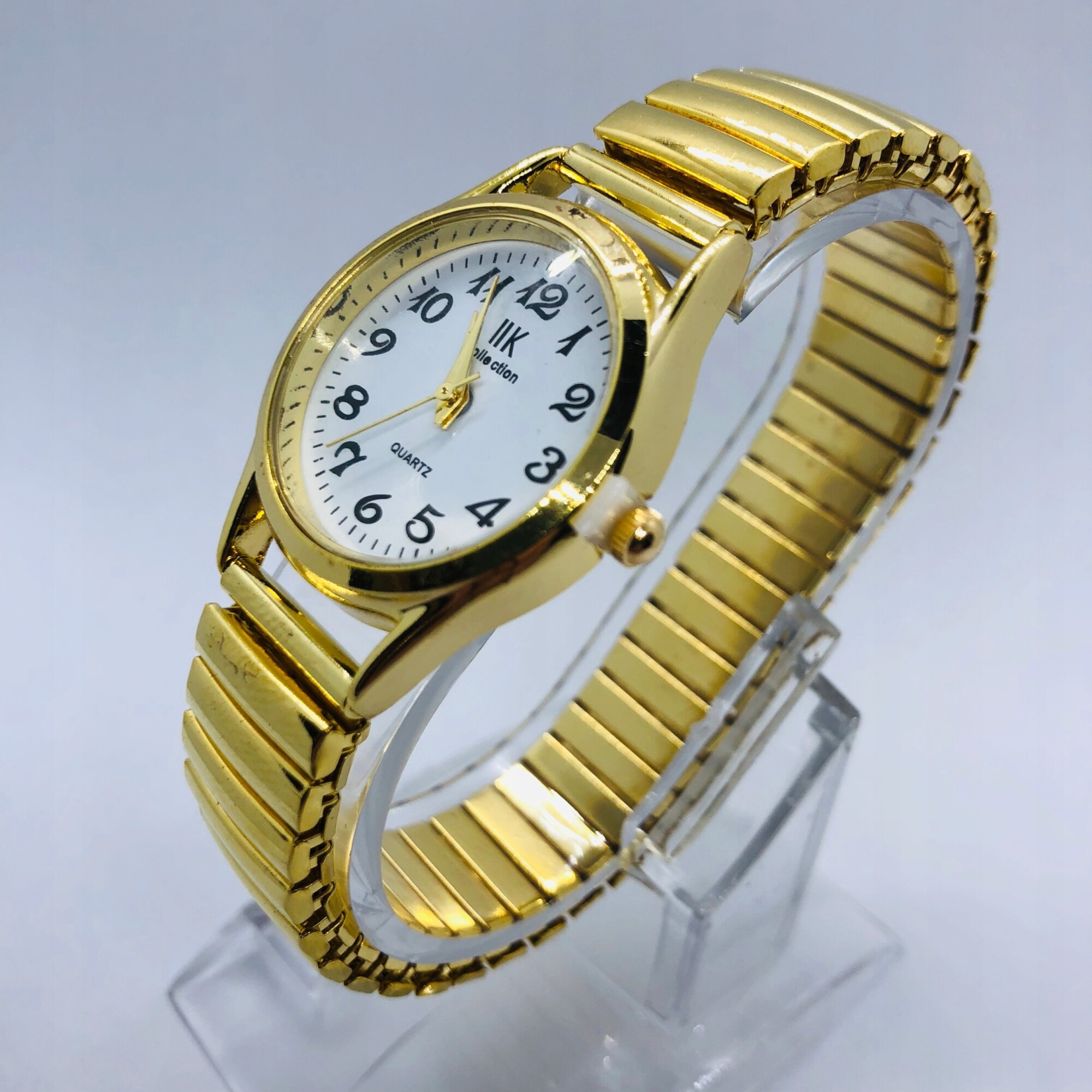 Zegarek damski męski wygodny rozciągliwy na gumce bransoleta złoty senior - obrazek 6